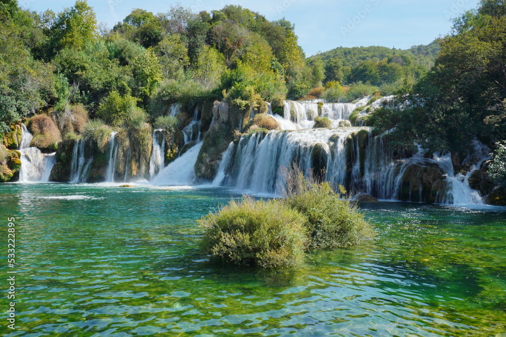 Obraz premium waterfall krka, national park in Croatia. green, blue water in lake and rivers, falling water from rocks on summer. Touristic