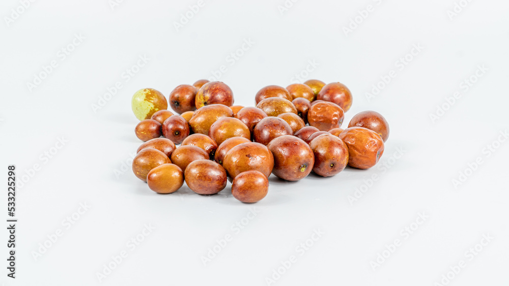 Jujube fruit. Group of raw organic jujube fruits isolated on white background. Jujube fruit. Group of raw organic jujube fruits isolated on white background.