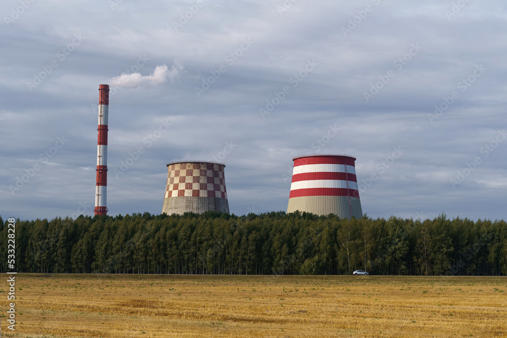 Three chimneys of CHP combined heat and power, factory smoke or fume Three chimneys of CHP combined heat and power, factory smoke or fume