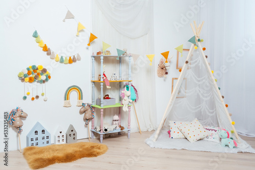 Obraz na plátně wigbam in the children's room with toys