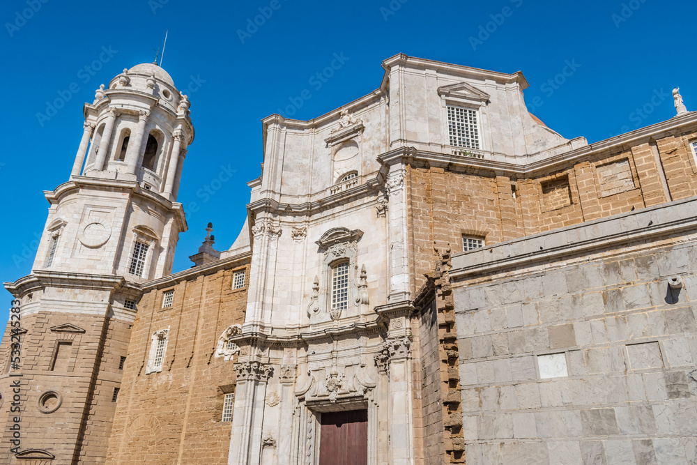 Exterior perspective of the Cathedral of La Santa Cruz with Baroque and Neoclassical style tower, Cadiz SPAIN