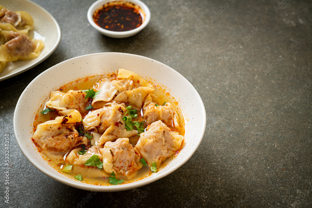 pork wonton soup or pork dumplings soup with roasted chili pork wonton soup or pork dumplings soup with roasted chili