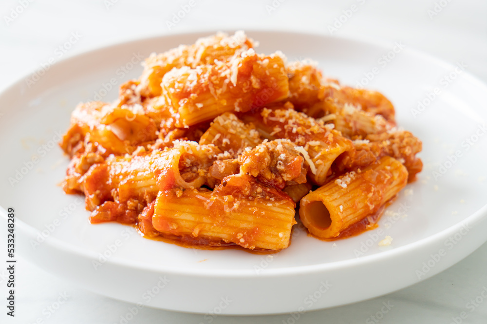 Rigatoni pasta bolognese with cheese Rigatoni pasta bolognese with cheese