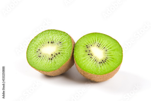  ripe kiwi fruits with slice isolated on white background