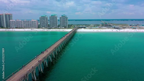 Wallpaper Mural Aerial view flying down the Navarre Beach FL Pier looking at the beautiful white sand, board walk, and the water tower. Torontodigital.ca