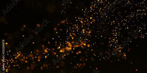 Gold Particle Glitter Luxury Background. Falling gold confetti with magic light. Gold particles glisten in the air