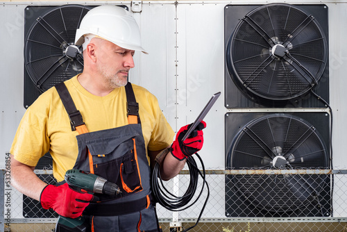 Man installs air conditione...