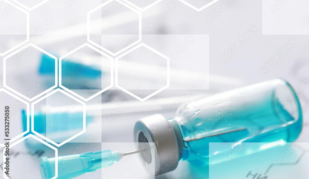 Fototapeta premium small jars with injection and syringe for injection on a blue background near the chemical formula