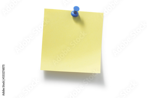 blue pushpin and yellow sticky notes