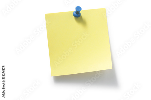 blue pushpin and yellow sticky notes