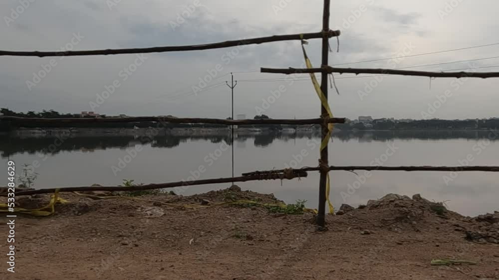 Wooden sticks frames at the shore of lake Wooden sticks frames at the shore of lake