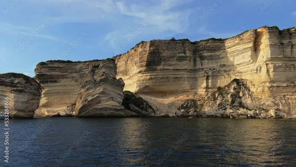 Fpv panning of Bonifacio Corse town built on high cliff seen from sailing boat along Corsica coast in France. 50fps Fpv panning of Bonifacio Corse town built on high cliff seen from sailing boat along Corsica coast in France. 50fps