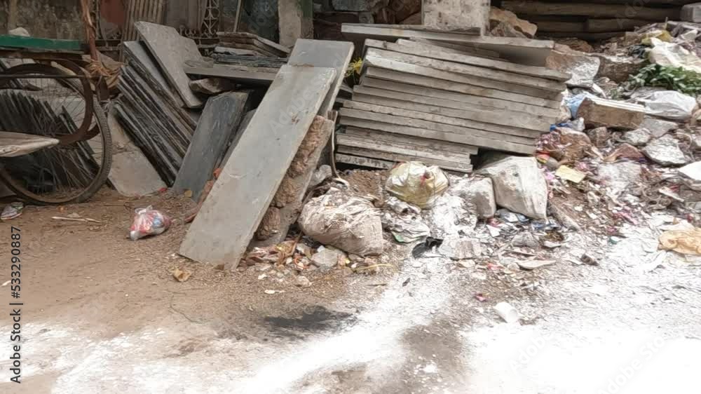 View of waste material and concrete slabs placed over one another View of waste material and concrete slabs placed over one another