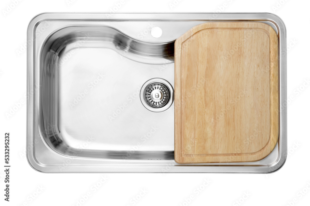 Top view of an empty sink with .wooden cutting boards.. Top view of an empty sink with .wooden cutting boards..