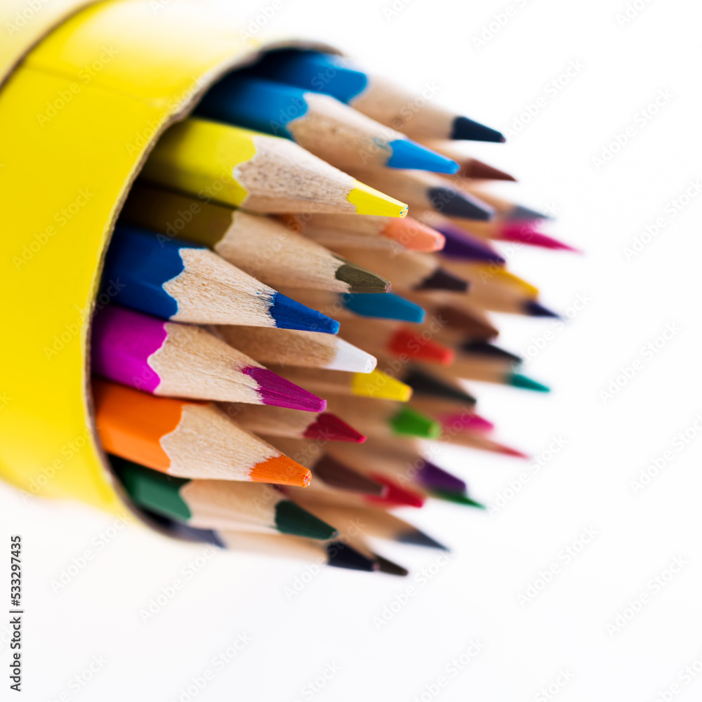 Many different colored pencils isolated on white background