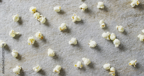 Image of close up of popcorn on gray background