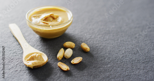 Image of close up of peanut butter on gray background