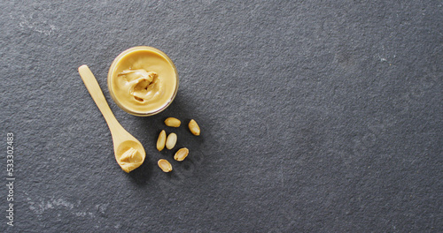 Image of close up of peanut butter on gray background