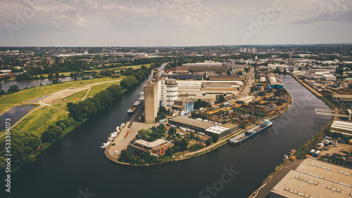 River flowing through Mulheim an der Ruhr city at sunset