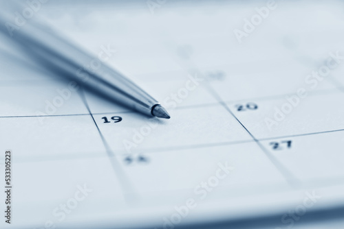Closeup of pen on calendar © xy