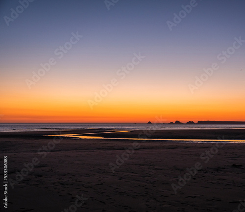 Idyllic view of sunset at beach photo