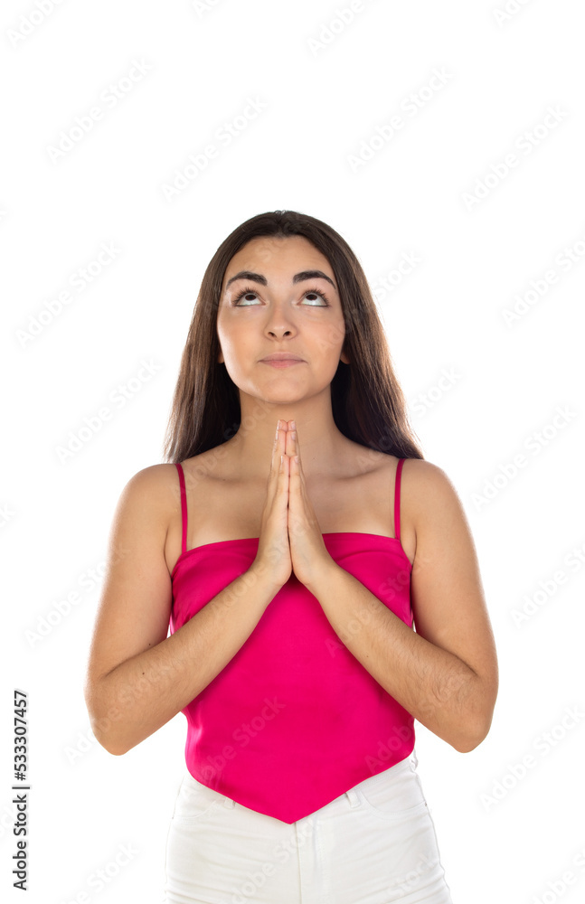 Brunette woman standing with praying hands Brunette woman standing with praying hands