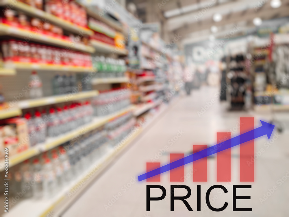 Sign price and growing up graph, Shop or supermarket shelfs out of focus. Basic food and goods rising price due to economic crisis concept. Increase in cost of living theme.