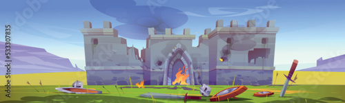Battle field with old medieval castle in fire, swords and shields on grass. Landscape of battlefield with fortress with broken stone walls and soldiers armors, vector cartoon illustration