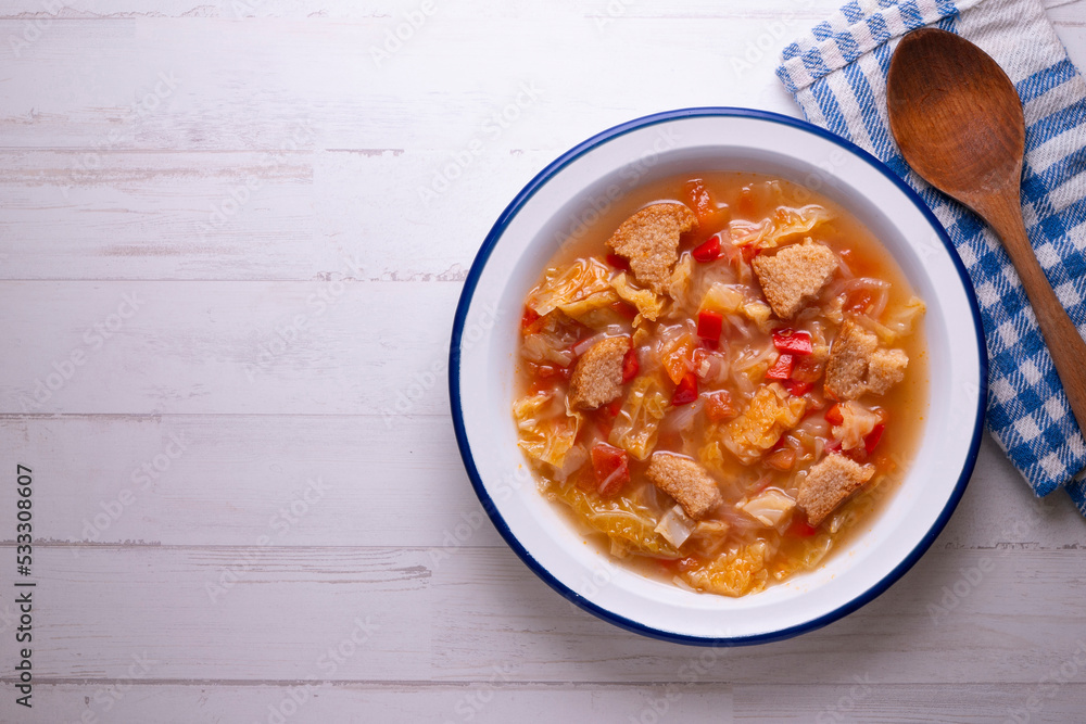 Menorcan soup. Traditional recipe from the island of Menorca in the Balearic Islands. Traditional tapas from the islands with bread, peppers and white cabbage. Menorcan soup. Traditional recipe from the island of Menorca in the Balearic Islands. Traditional tapas from the islands with bread, peppers and white cabbage.
