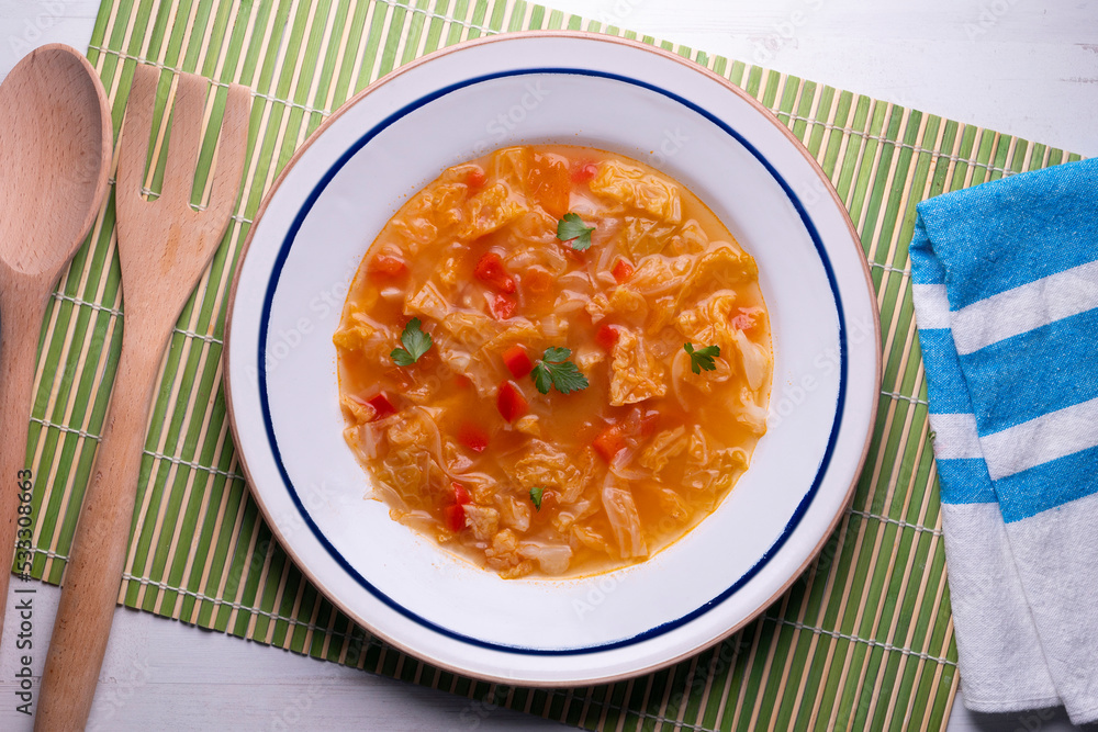 Menorcan soup. Traditional recipe from the island of Menorca in the Balearic Islands. Traditional tapas from the islands with bread, peppers and white cabbage. Menorcan soup. Traditional recipe from the island of Menorca in the Balearic Islands. Traditional tapas from the islands with bread, peppers and white cabbage.