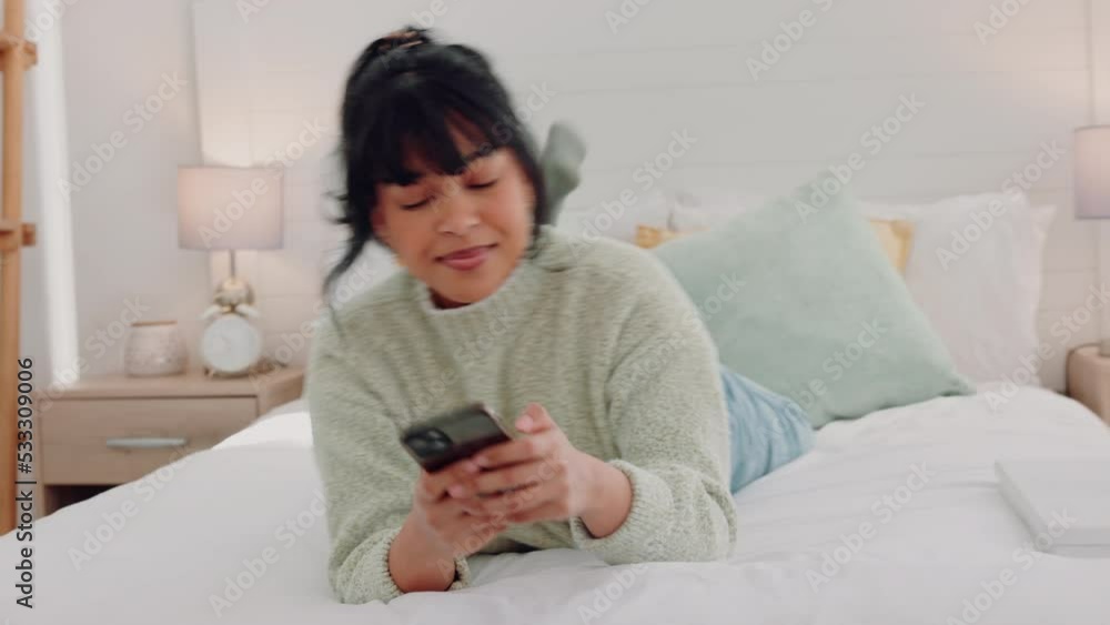 Bed, phone and woman text and relax in her a bedroom, happy and cheerful while social media. Communication, internet and home entertainment by black female enjoy online conversation and subscription Bed, phone and woman text and relax in her a bedroom, happy and cheerful while social media. Communication, internet and home entertainment by black female enjoy online conversation and subscription