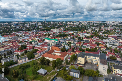 aerial panoramic view from great height on red roofs of historical center of old big city © hiv360
