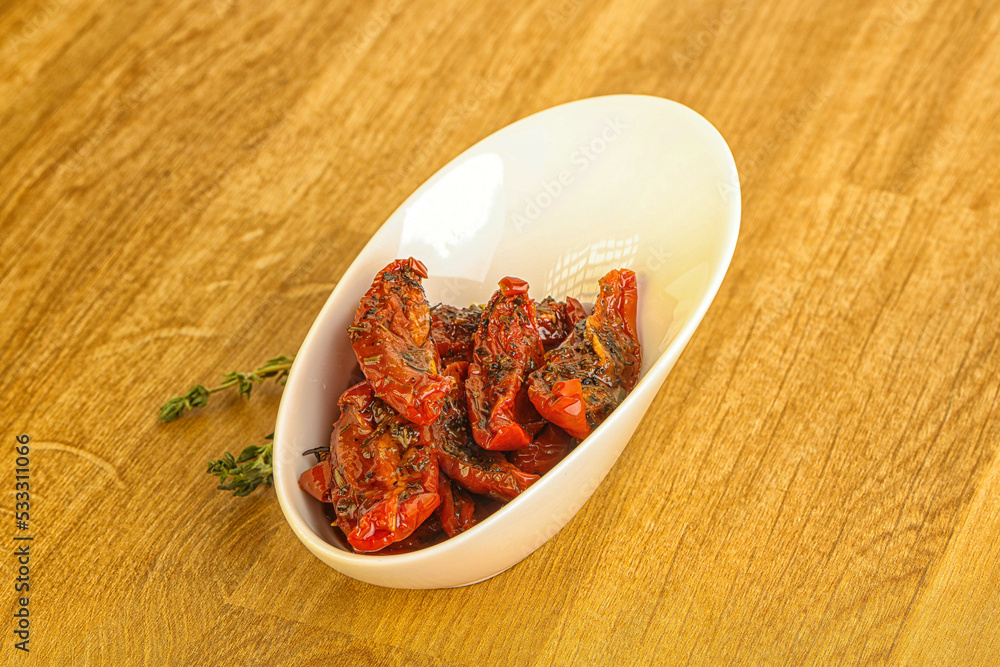 Sun-dried natural Italian tomato in the bowl Sun-dried natural Italian tomato in the bowl