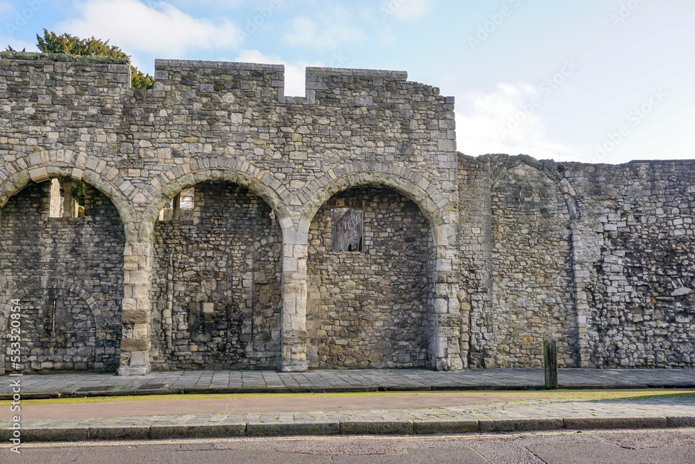 Old city walls in Southampton England. Historic stone walls once the defence of port city 