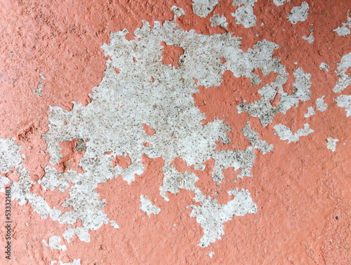 Old wall background - city building decay texture. Urban decline pattern with peeling paint © Suwit