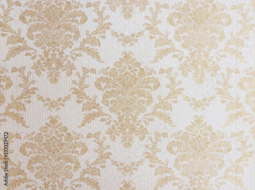 Fragment of colorful retro tapestry textile pattern with floral ornament useful as background