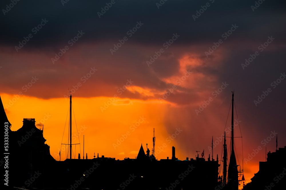 Naklejka premium Sunset hues over Copenhagen, Denmark