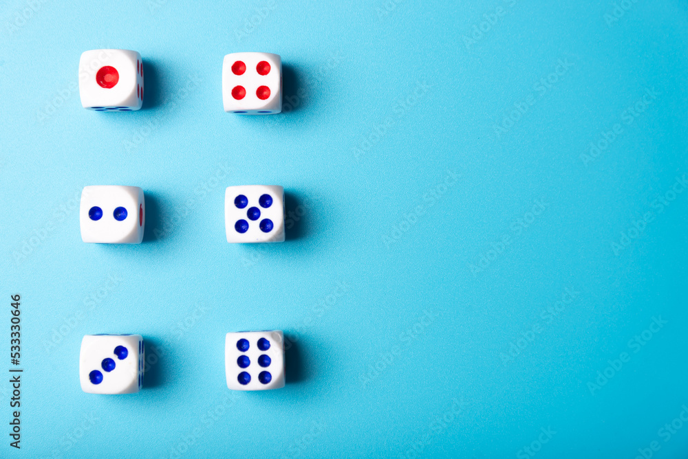 Dice with numbers on a blue background. Dice minimalism Dice with numbers on a blue background. Dice minimalism
