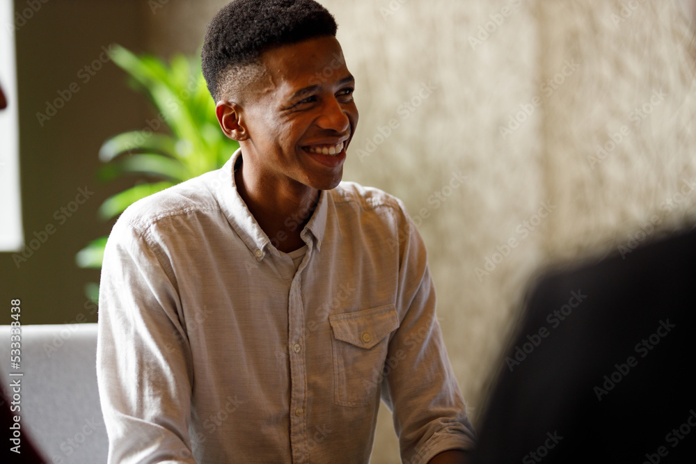 Portrait of confident smiling African American business man attending a business meeting in office. Portrait of confident smiling African American business man attending a business meeting in office.