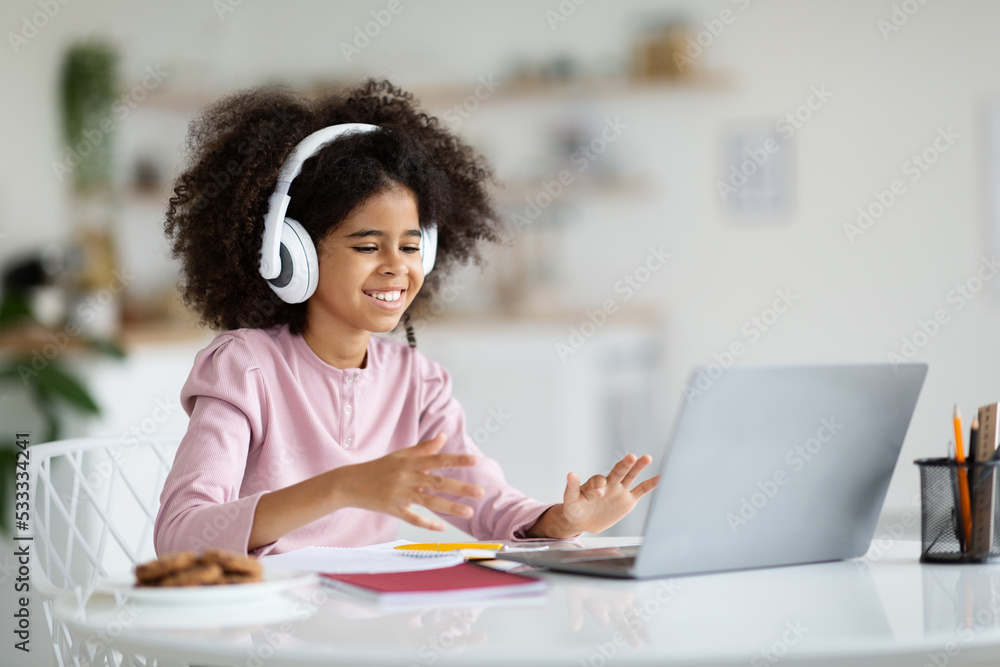 African american girl schooler having video call with tutor African american girl schooler having video call with tutor