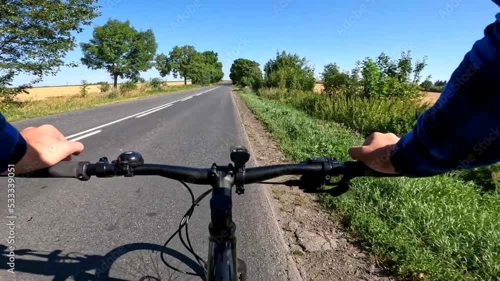 Gravel bicycle ride on the road in the summer season Gravel bicycle ride on the road in the summer season