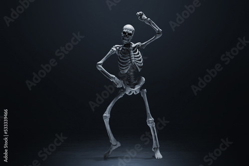 Human skeleton dancing on dark background