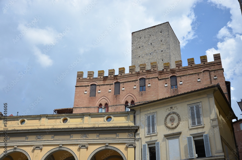 Fototapeta premium The beautiful countryside and town of Siena in Tuscany on a bright summer day with its typical Tuscan medieval style