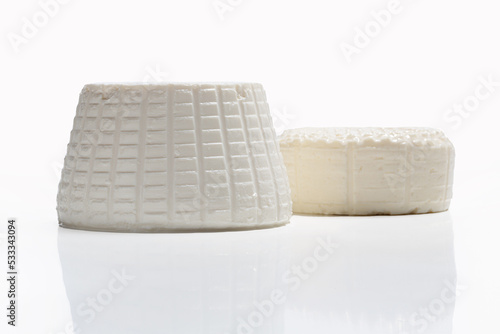 fresh white cheeses isolated on a white background