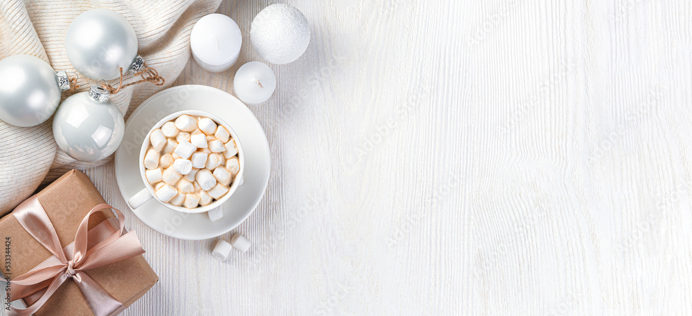 Christmas background with coffee with marshmallows, candles and Christmas decorations. Merry Christmas, New Year. Top view, copy space Christmas background with coffee with marshmallows, candles and Christmas decorations. Merry Christmas, New Year. Top view, copy space
