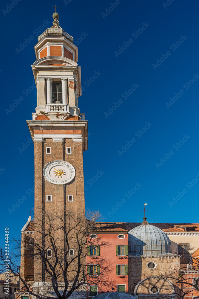 Tower clock of the Church of the Holy Apostles of Christ . Itis a 7th-century Roman Catholic church built in Renaissance architecture. Venice, Italy, 2019