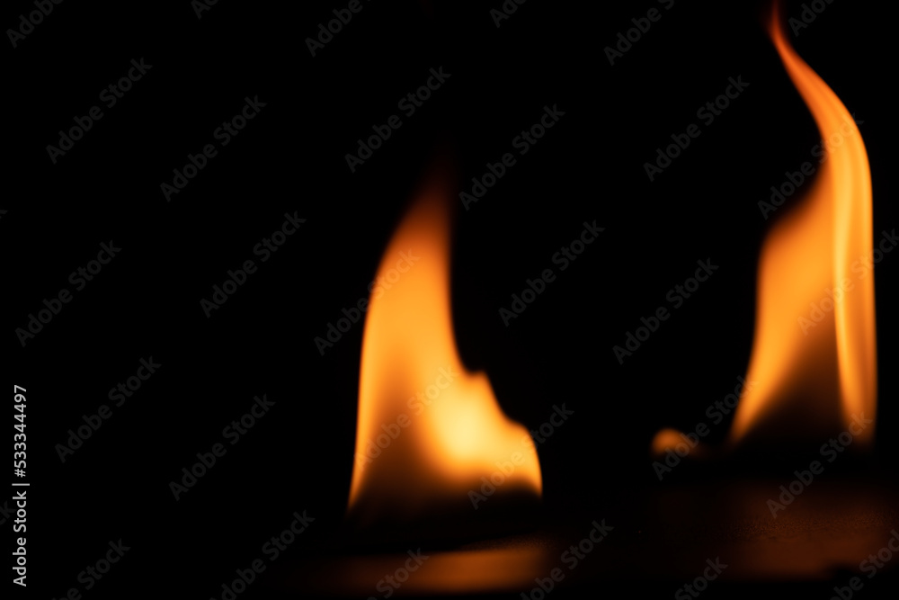 burning power of the flame, Flames, and burning sparks close-up, fire patterns, the glow of fire in the dark burning power of the flame, Flames, and burning sparks close-up, fire patterns, the glow of fire in the dark