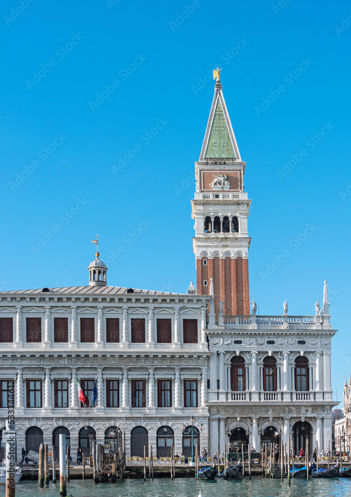 Facade of St. Mark's Clocktower and Palace, in Italo-Byzantine architecture, symbol of Venetian wealth and power, since 11th century it known as Church of Gold. 2019