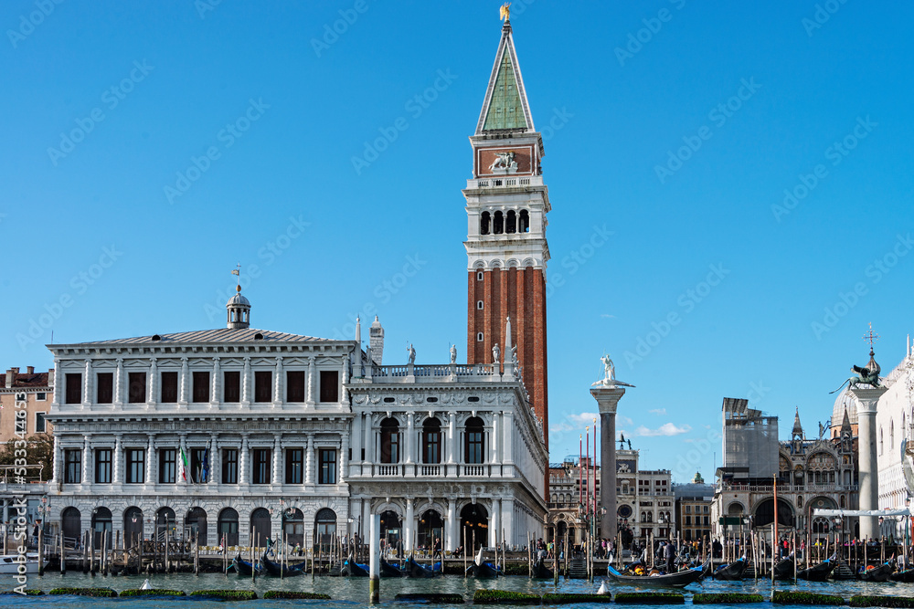 Facade of St. Mark's Clocktower and Palace, in Italo-Byzantine architecture, symbol of Venetian wealth and power, since 11th century it known as Church of Gold. 2019