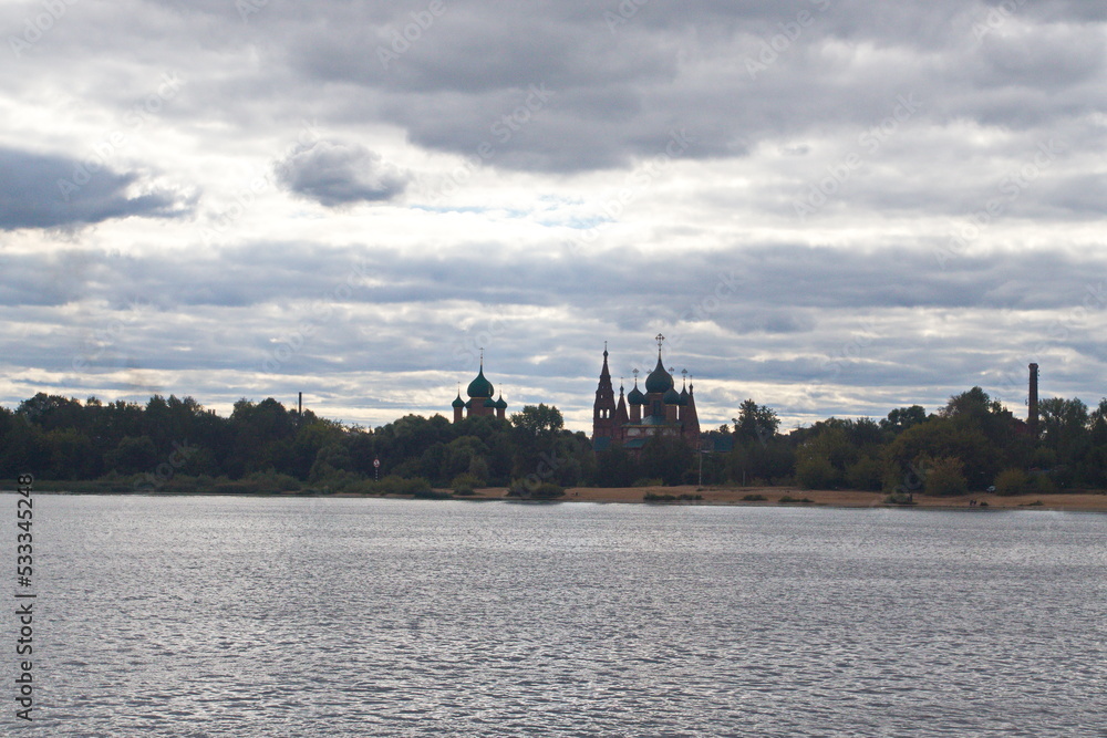 Naklejka premium Church banks of the Volga River